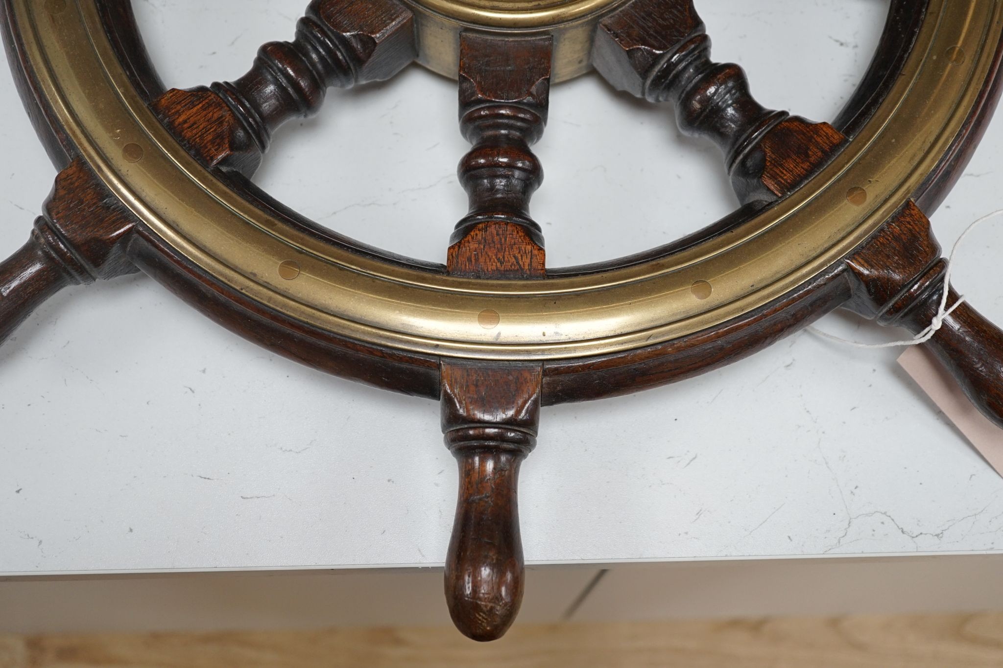 A 19th century mahogany and brass mounted ship's wheel, 60cm